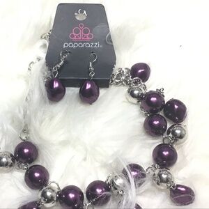 Purple beaded necklace with earrings.